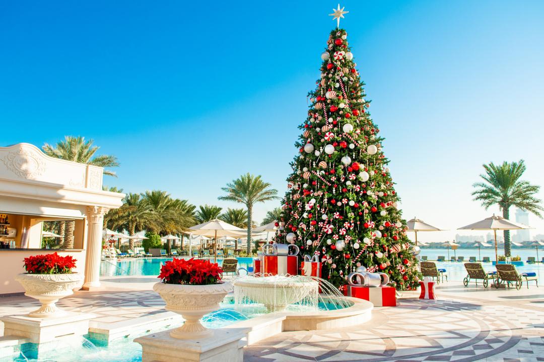 Dubai Christmas rooftop party Palm Jumeirah, desert bonfire Al Qudra festive, unique UAE celebrations - Christmas in Dubai: Festive Lights, Events & Best Places to Visit ...